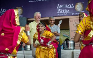 Clinton is delighted to watch a cultural programme arranged at the school